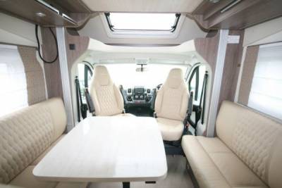 IT 590 Sovereign side profile|LED daytime running lights|Sovereign cab with leather steering|Cruise control|Alloy wheels|Dual airbags|Leather surround lounge|Washroom with separate shower|Swivel pilot seats|Drop down bed|L kitchen|Forward living space|