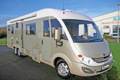 Elegance i821 2001|Elegance 2001 rear|Overcab pull down bed|Rear bed|Spacioud lounge|L kitchen with full cooker|View toward rear bedroom|Standalone shower unit|Spacious washroom|Rear fixed bed|