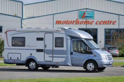 Burstner 2007 Nexxo t660|Burstner 2007 Nexxo T660|Nexxo t660 external|Nexxo t660 with Bike Rack|Lounge with Nova Life Upholstery|Swivel Captain Seats|Low French Bed|L Shaped kitchen|Washroom|