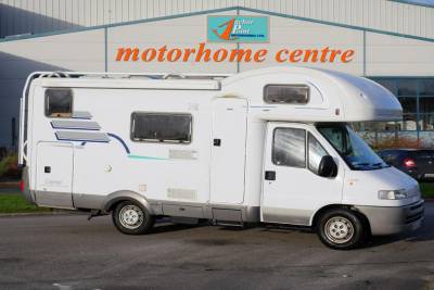 2000 Hymer Camp 524|Hymer double dinette|Large rear garage|Bunk Beds|Dinetter and double bed|Bottom bunks lifts for storage|Front to rear habitation|Washroom and shower|Rear to front habitation|Hymer Camp External|